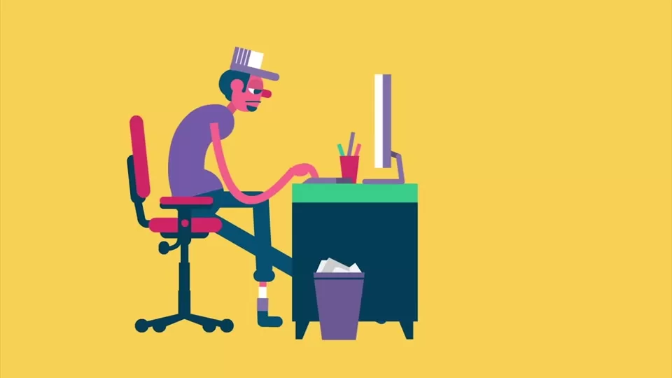 Desk setup with screen at eye level and ergonomic support for sitting
